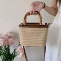 Women's Straw Woven Bucket Bag with Bamboo Handle, Crossbody Shoulder Bag for Beach, Travel & Summer Daily Use